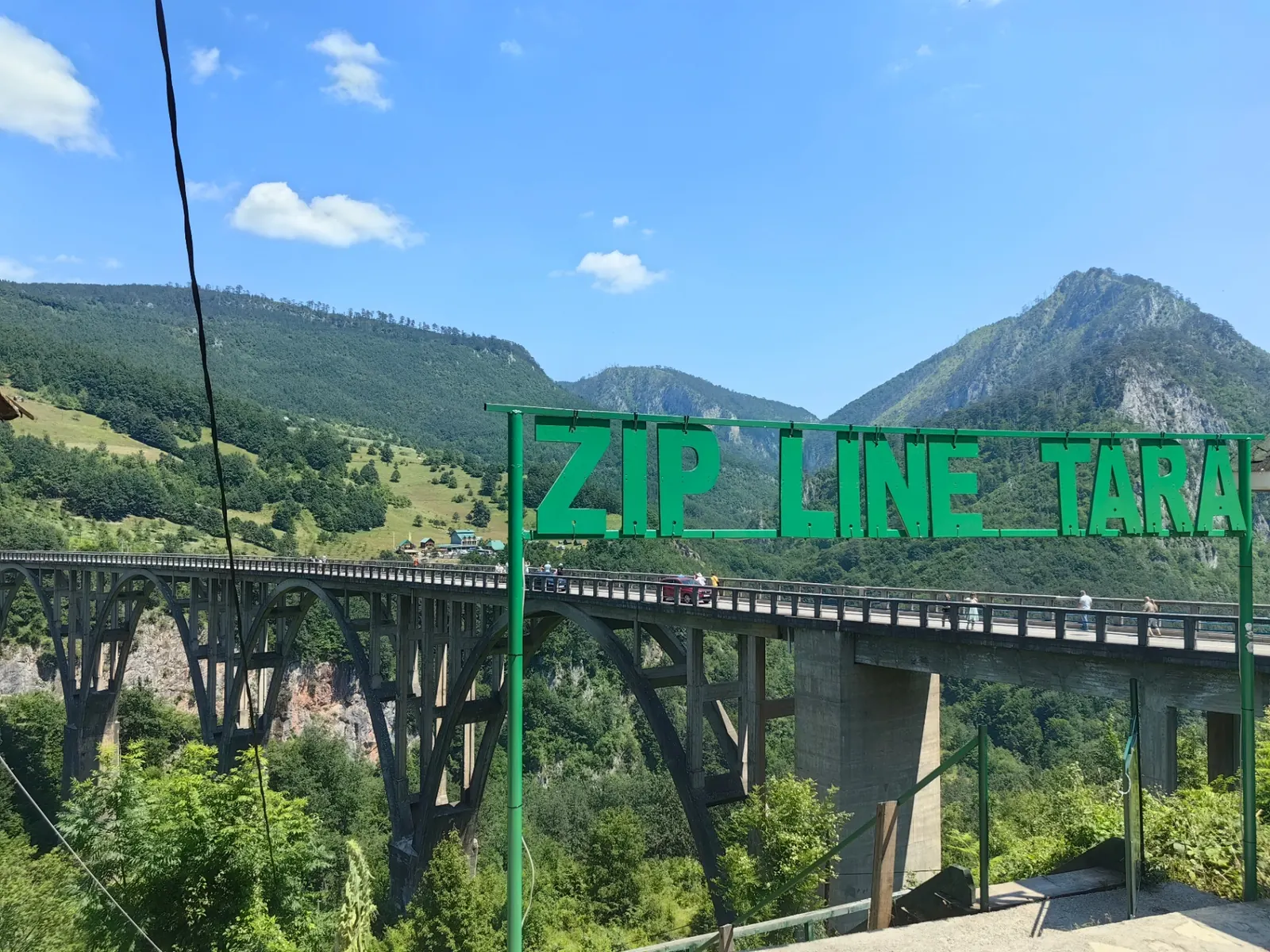 Đurđevića Tara Bridge with the Tara zip line sign in the foreground